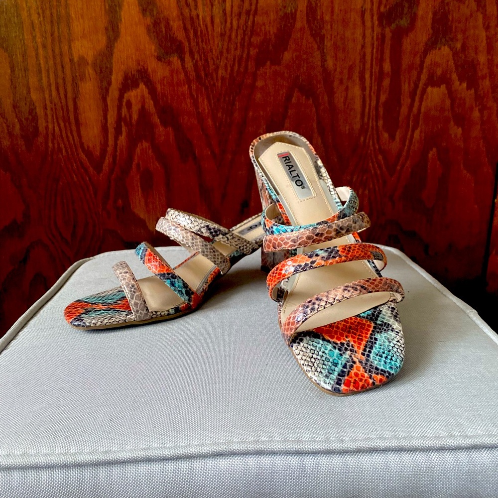 Women’s orange and teal snakeskin mule with elegant